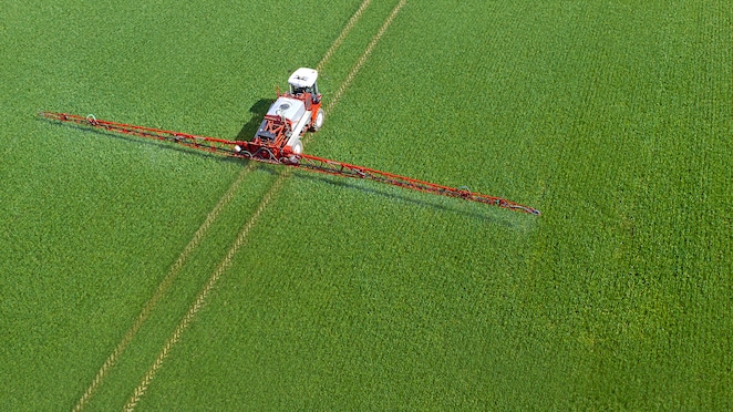 Harvester in field