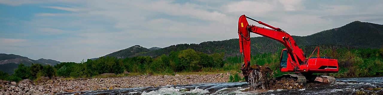 Excavator working in water