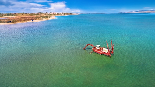 Combine harvester in low light