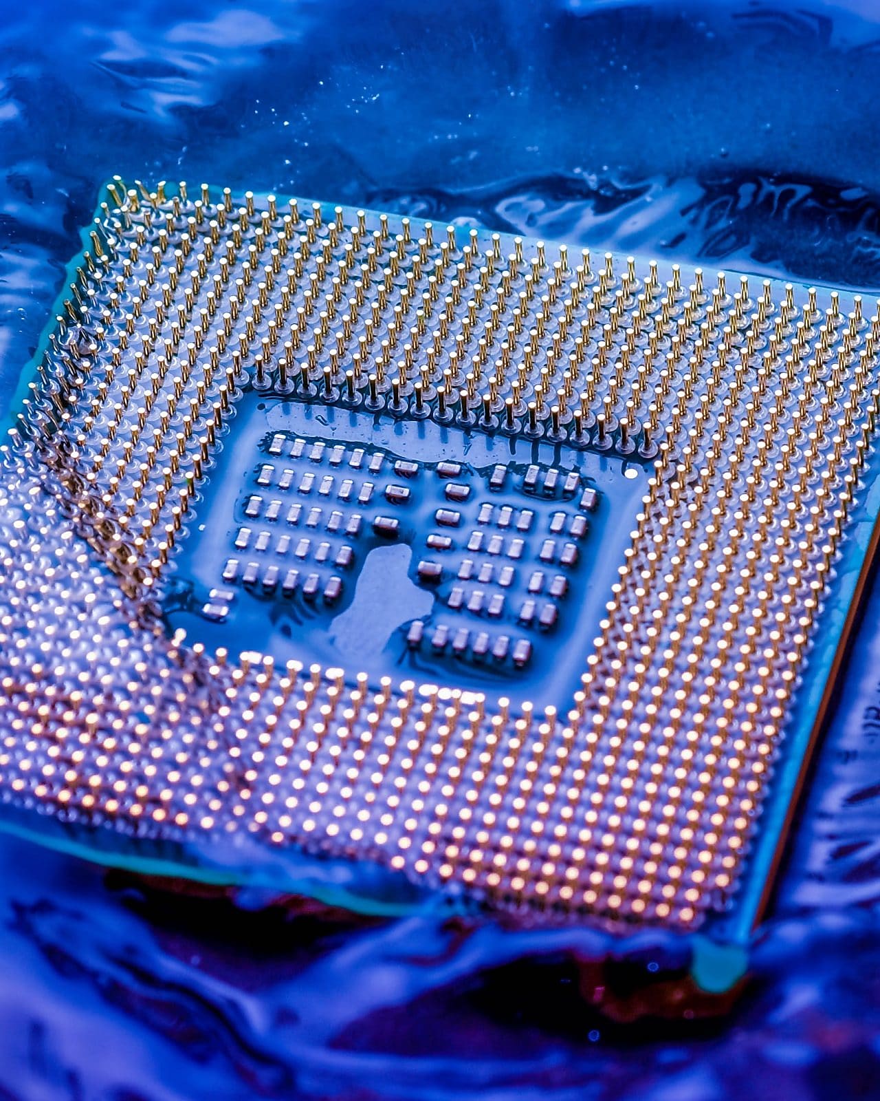 CPU RAM computer Fall into the water on blue light background